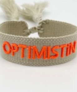 Beiges Armband von Moselzeug mit Schriftzug Optimistin